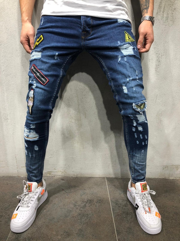 Fashion New Male hole badge embroidery denim trousers pants Men&#39;s streetwear hiphop skinny Casual Patch Jeans